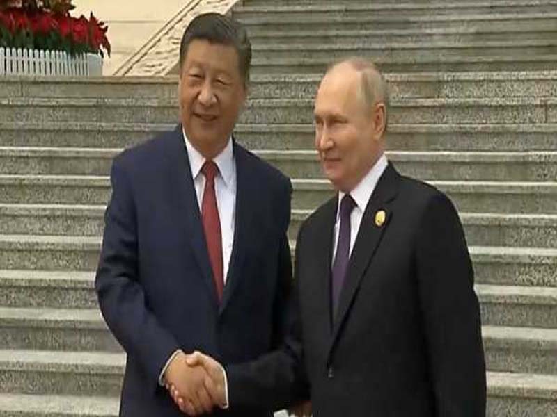 Putin and Chinese Premier Xi have talks.